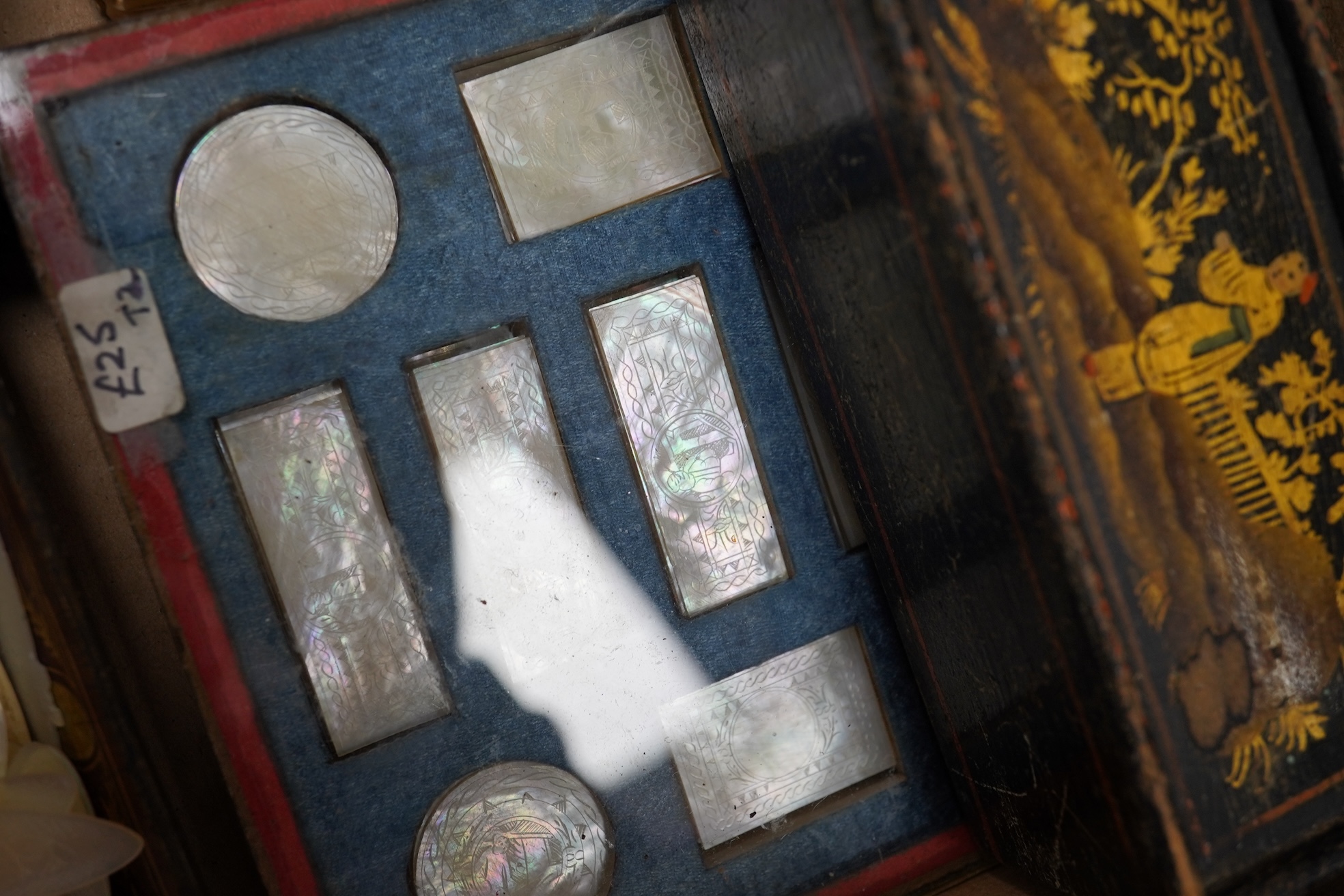 A group of 19th century Chinese mother of pearl gaming counters and accessories, together with a miniature silver cased compass
